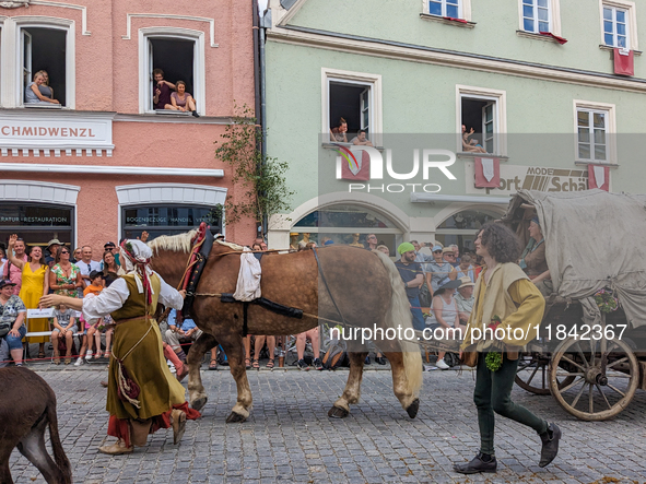 Over 2,000 participants recreate the medieval wedding of Hedwig Jagiellon and George of Bavaria. On July 16, 2023, in Landshut, Bavaria, Ger...