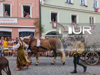 Over 2,000 participants recreate the medieval wedding of Hedwig Jagiellon and George of Bavaria. On July 16, 2023, in Landshut, Bavaria, Ger...