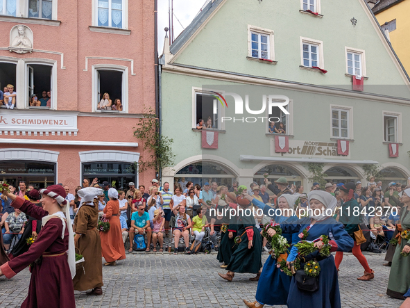 Over 2,000 participants recreate the medieval wedding of Hedwig Jagiellon and George of Bavaria. On July 16, 2023, in Landshut, Bavaria, Ger...