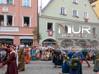 Over 2,000 participants recreate the medieval wedding of Hedwig Jagiellon and George of Bavaria. On July 16, 2023, in Landshut, Bavaria, Ger...