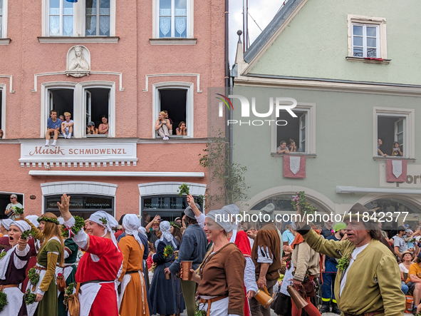 Over 2,000 participants recreate the medieval wedding of Hedwig Jagiellon and George of Bavaria. On July 16, 2023, in Landshut, Bavaria, Ger...