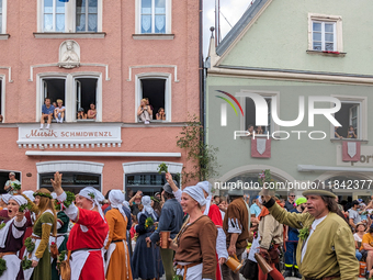 Over 2,000 participants recreate the medieval wedding of Hedwig Jagiellon and George of Bavaria. On July 16, 2023, in Landshut, Bavaria, Ger...