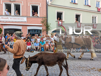 Over 2,000 participants recreate the medieval wedding of Hedwig Jagiellon and George of Bavaria. On July 16, 2023, in Landshut, Bavaria, Ger...