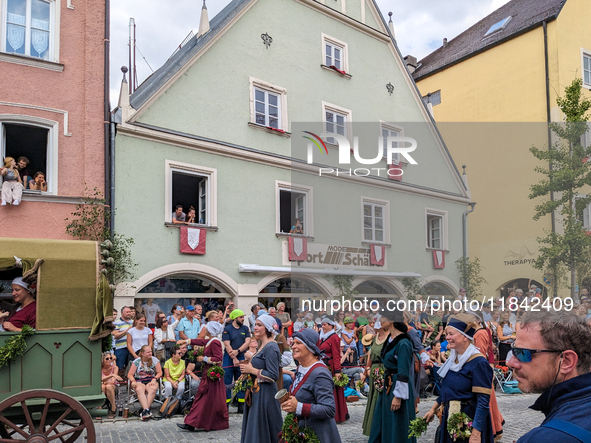 Over 2,000 participants recreate the medieval wedding of Hedwig Jagiellon and George of Bavaria. On July 16, 2023, in Landshut, Bavaria, Ger...