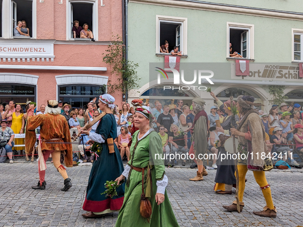 Over 2,000 participants recreate the medieval wedding of Hedwig Jagiellon and George of Bavaria. On July 16, 2023, in Landshut, Bavaria, Ger...