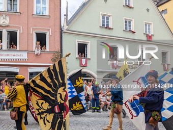 Over 2,000 participants recreate the medieval wedding of Hedwig Jagiellon and George of Bavaria. On July 16, 2023, in Landshut, Bavaria, Ger...