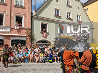 Over 2,000 participants recreate the medieval wedding of Hedwig Jagiellon and George of Bavaria. On July 16, 2023, in Landshut, Bavaria, Ger...