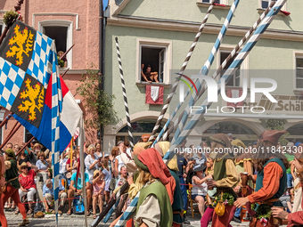 Over 2,000 participants recreate the medieval wedding of Hedwig Jagiellon and George of Bavaria. On July 16, 2023, in Landshut, Bavaria, Ger...