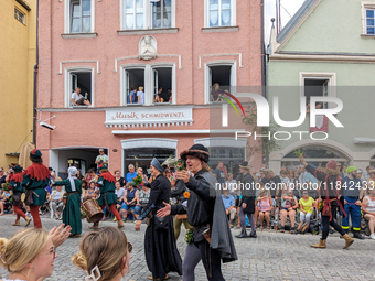 Over 2,000 participants recreate the medieval wedding of Hedwig Jagiellon and George of Bavaria. On July 16, 2023, in Landshut, Bavaria, Ger...