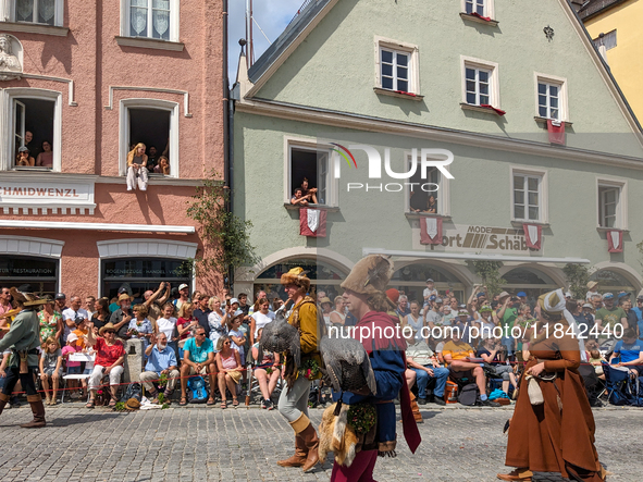 Over 2,000 participants recreate the medieval wedding of Hedwig Jagiellon and George of Bavaria. On July 16, 2023, in Landshut, Bavaria, Ger...