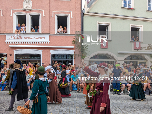 Over 2,000 participants recreate the medieval wedding of Hedwig Jagiellon and George of Bavaria. On July 16, 2023, in Landshut, Bavaria, Ger...