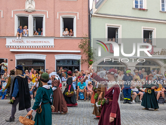 Over 2,000 participants recreate the medieval wedding of Hedwig Jagiellon and George of Bavaria. On July 16, 2023, in Landshut, Bavaria, Ger...