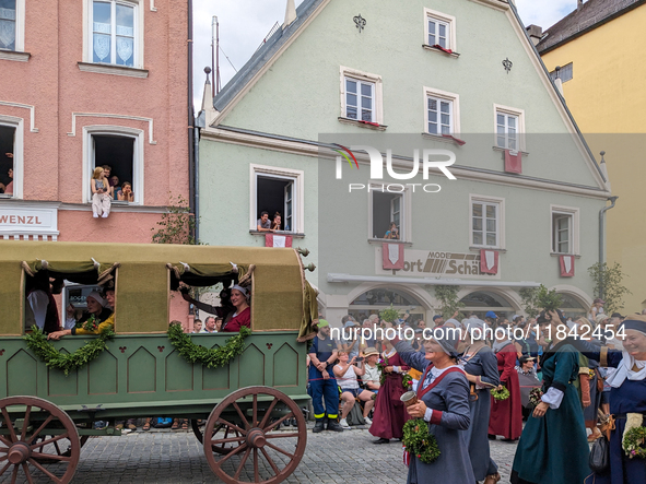 Over 2,000 participants recreate the medieval wedding of Hedwig Jagiellon and George of Bavaria. On July 16, 2023, in Landshut, Bavaria, Ger...