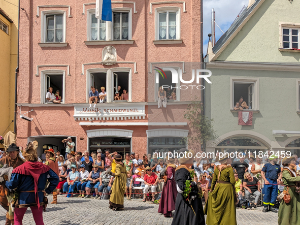 Over 2,000 participants recreate the medieval wedding of Hedwig Jagiellon and George of Bavaria. On July 16, 2023, in Landshut, Bavaria, Ger...