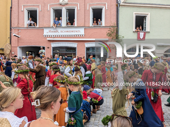 Over 2,000 participants recreate the medieval wedding of Hedwig Jagiellon and George of Bavaria. On July 16, 2023, in Landshut, Bavaria, Ger...