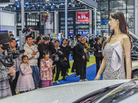 Visitors visit the Jetta booth at the 2024 ASEAN International Auto Show in Nanning, China, on December 7, 2024. (