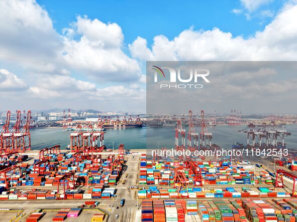 A working scene of a foreign trade container terminal is seen at Qingdao Port in Qingdao, China, on December 7, 2024. 