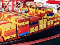 Cargo ships load and unload containers at the foreign trade container terminal in Qingdao Port in Qingdao, China, on December 7, 2024. (