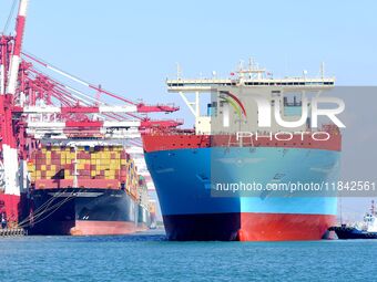 A cargo ship berths at the foreign trade container terminal of Qianwan Port in Qingdao, China, on December 7, 2024. (