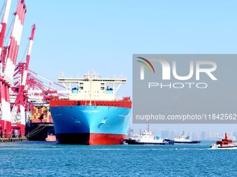 A cargo ship berths at the foreign trade container terminal of Qianwan Port in Qingdao, China, on December 7, 2024. (