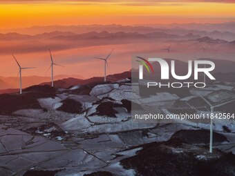 Wind turbines operate at Barren Mountain Wind Farm in Yichang, Hubei province, China, on December 6, 2024. (