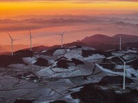 Wind turbines operate at Barren Mountain Wind Farm in Yichang, Hubei province, China, on December 6, 2024. (