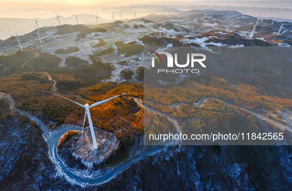 Wind turbines operate at Barren Mountain Wind Farm in Yichang, Hubei province, China, on December 6, 2024. 