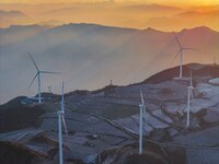 Wind turbines operate at Barren Mountain Wind Farm in Yichang, Hubei province, China, on December 6, 2024. (