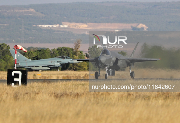 A Lockheed Martin F-35A Lightning II of the Italy Air Force heads to the runway to take off from Los Llanos military air base during the Tac...