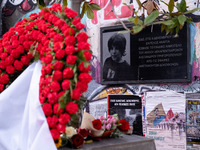 People leave flowers at the monument of Alexis Grigoropoulos in Athens, Greece, on December 6, 2024, marking the 16th anniversary of the dea...