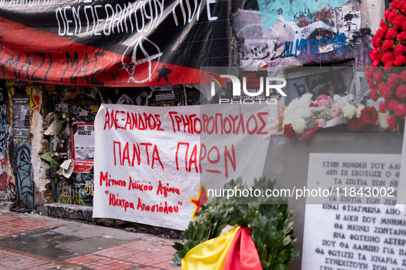 People leave flowers at the monument of Alexis Grigoropoulos in Athens, Greece, on December 6, 2024, marking the 16th anniversary of the dea...