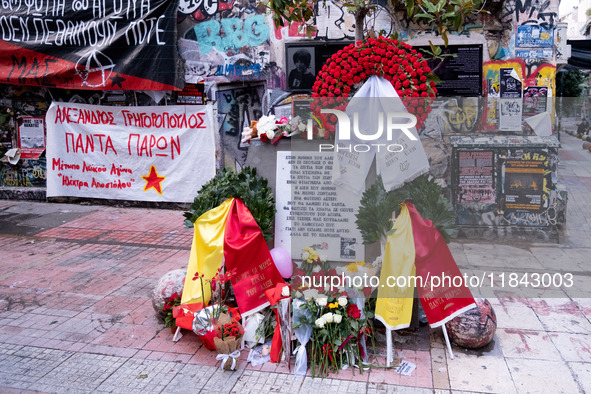 People leave flowers at the monument of Alexis Grigoropoulos in Athens, Greece, on December 6, 2024, marking the 16th anniversary of the dea...