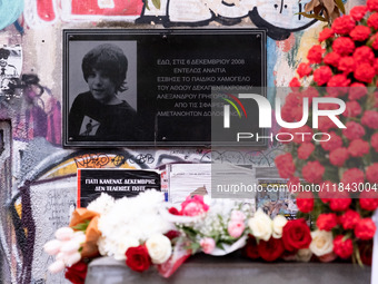 People leave flowers at the monument of Alexis Grigoropoulos in Athens, Greece, on December 6, 2024, marking the 16th anniversary of the dea...