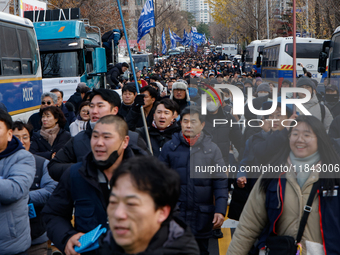 Citizens gather in Yeouido, South Korea, on December 7, 2024, to demand the impeachment and resignation of President Yoon Suk Yeol. Yoon's a...