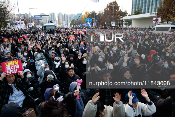 Citizens gather in Yeouido, South Korea, on December 7, 2024, to demand the impeachment and resignation of President Yoon Suk Yeol. Yoon's a...