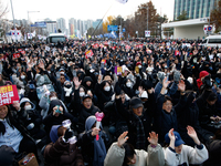 Citizens gather in Yeouido, South Korea, on December 7, 2024, to demand the impeachment and resignation of President Yoon Suk Yeol. Yoon's a...