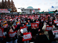 Citizens gather in Yeouido, South Korea, on December 7, 2024, to demand the impeachment and resignation of President Yoon Suk Yeol. Yoon's a...