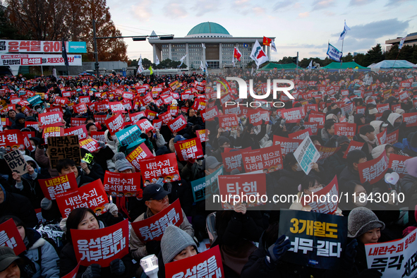 Citizens gather in Yeouido, South Korea, on December 7, 2024, to demand the impeachment and resignation of President Yoon Suk Yeol. Yoon's a...