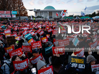 Citizens gather in Yeouido, South Korea, on December 7, 2024, to demand the impeachment and resignation of President Yoon Suk Yeol. Yoon's a...