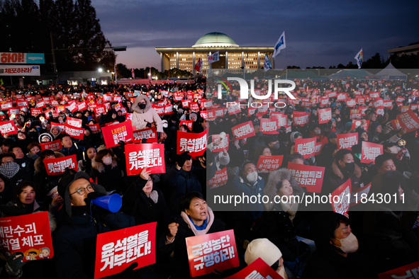 Citizens gather in Yeouido, South Korea, on December 7, 2024, to demand the impeachment and resignation of President Yoon Suk Yeol. Yoon's a...