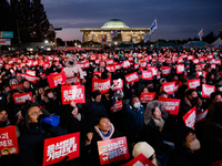 Citizens gather in Yeouido, South Korea, on December 7, 2024, to demand the impeachment and resignation of President Yoon Suk Yeol. Yoon's a...