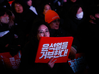 Citizens gather in Yeouido, South Korea, on December 7, 2024, to demand the impeachment and resignation of President Yoon Suk Yeol. Yoon's a...