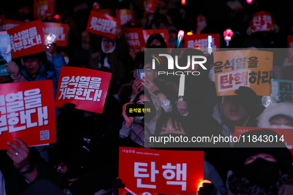 Citizens gather in Yeouido, South Korea, on December 7, 2024, to demand the impeachment and resignation of President Yoon Suk Yeol. Yoon's a...