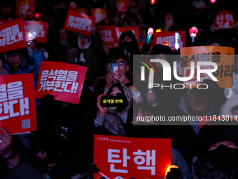 Citizens gather in Yeouido, South Korea, on December 7, 2024, to demand the impeachment and resignation of President Yoon Suk Yeol. Yoon's a...