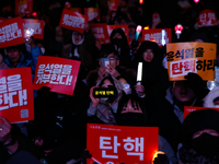 Citizens gather in Yeouido, South Korea, on December 7, 2024, to demand the impeachment and resignation of President Yoon Suk Yeol. Yoon's a...