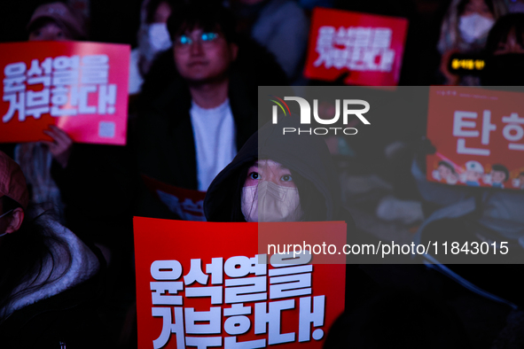 Citizens gather in Yeouido, South Korea, on December 7, 2024, to demand the impeachment and resignation of President Yoon Suk Yeol. Yoon's a...