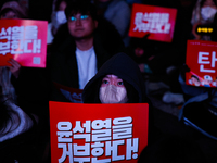 Citizens gather in Yeouido, South Korea, on December 7, 2024, to demand the impeachment and resignation of President Yoon Suk Yeol. Yoon's a...