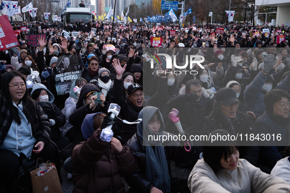 Citizens gather in Yeouido, South Korea, on December 7, 2024, to demand the impeachment and resignation of President Yoon Suk Yeol. Yoon's a...