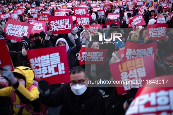 Citizens gather in Yeouido, South Korea, on December 7, 2024, to demand the impeachment and resignation of President Yoon Suk Yeol. Yoon's a...