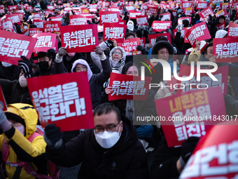 Citizens gather in Yeouido, South Korea, on December 7, 2024, to demand the impeachment and resignation of President Yoon Suk Yeol. Yoon's a...